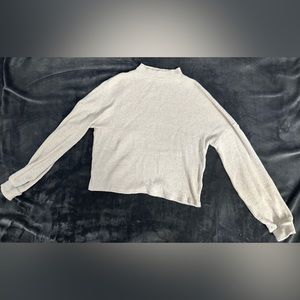 Cream low turtle neck sweater
